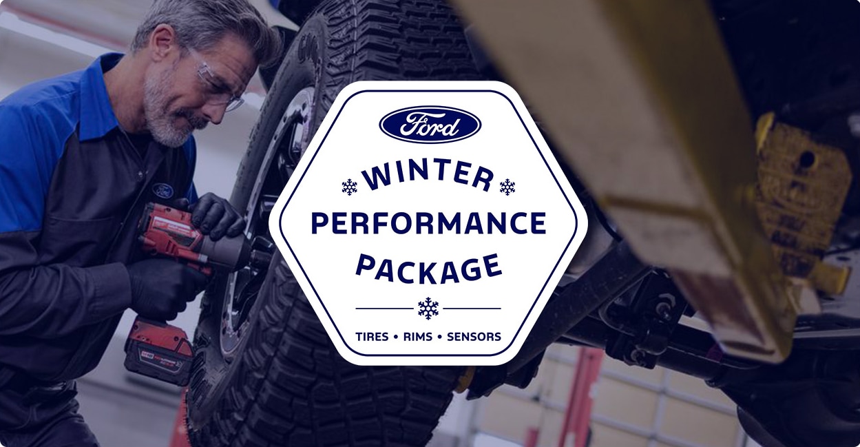 A Ford Service Technician installs a tire, with a graphic overlay promoting the Ford Winter Performance Package, including tires, rims, and sensors.