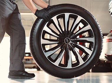 Lincoln Technician rolling tire