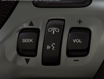 Voice command buttons are shown on the steering wheel of a Lincoln vehicle