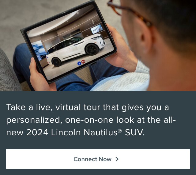 A person watches a Lincoln Nautilus virtual tour on a tablet
