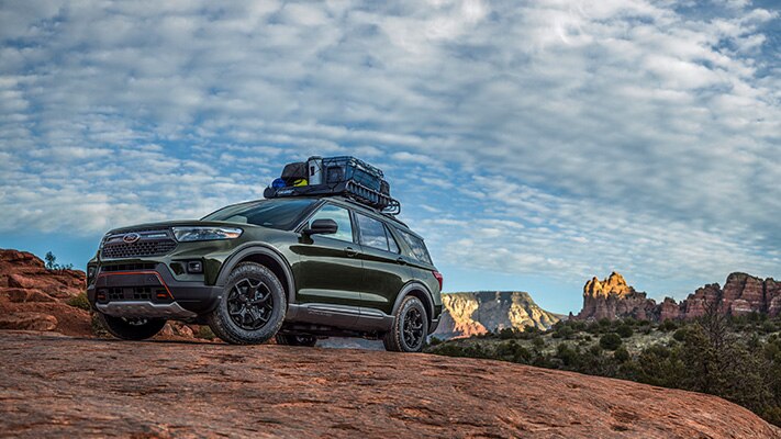 The Ford Explorer® SUV with available Ford Accessories roof-rack off road in the desert. 