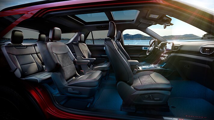 The interior of a 2023 Ford Explorer® SUV parked next to a seaside area.